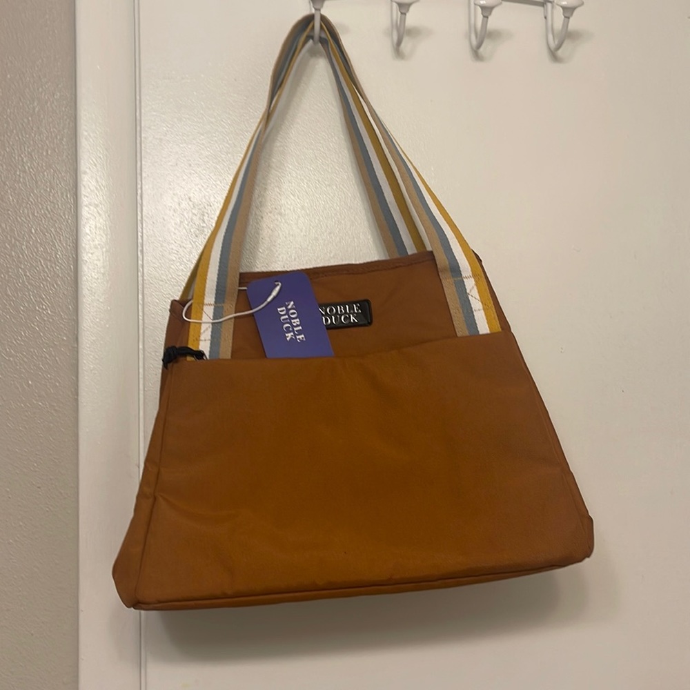 Small dog carrier. Tan, brand new with tags.